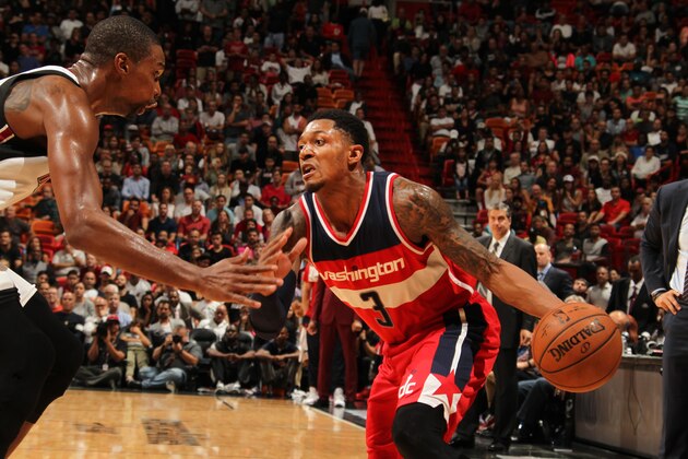 MIAMI, FL - DECEMBER 7: Bradley Beal #3 of the Washington Wizards drives to the basket against the Miami Heat during the game on December 7, 2015 at American Airlines Arena in Minneapolis, Florida. NOTE TO USER: User expressly acknowledges and agrees that, by downloading and or using this Photograph, user is consenting to the terms and conditions of the Getty Images License Agreement. Mandatory Copyright Notice: Copyright 2015 NBAE (Photo by Issac Baldizon/NBAE via Getty Images)