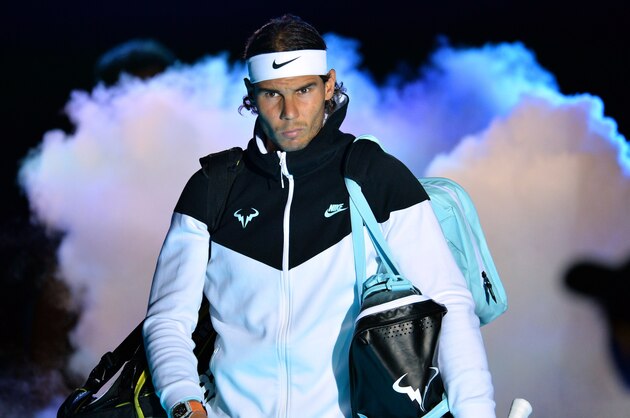 Spain's Rafael Nadal walks onto court for a men's singles group stage match against Britain's Andy Murray on day four of the ATP World Tour Finals tennis tournament in London on November 18, 2015. 
AFP PHOTO / GLYN KIRK        (Photo credit should read GLYN KIRK/AFP/Getty Images)