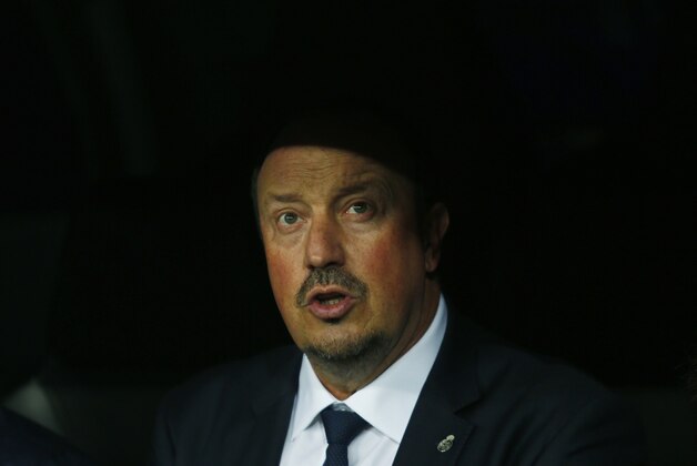 Real Madrid’s head coach Rafael Benitez waits for the start of a Champions League group A soccer match between Real Madrid and Malmo at the Santiago Bernabeu stadium in Madrid, Tuesday, Dec. 8, 2015. (AP Photo/Francisco Seco)