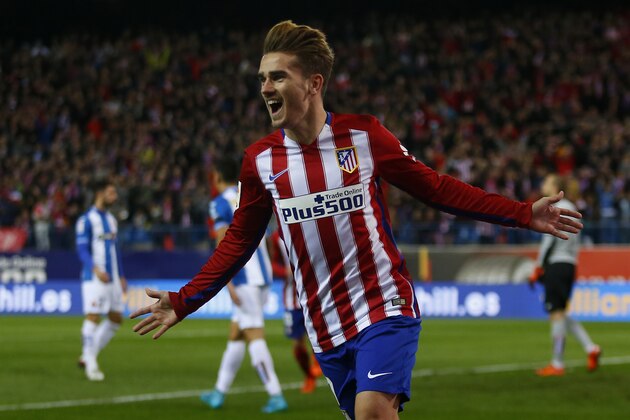 Atletico Madrid's Antoine Griezmann celebrates after scoring the opening goal against Espanyol during a Spanish La Liga soccer match between Atletico Madrid and Espanyol at the Vicente Calderon stadium in Madrid, Saturday, Nov. 28, 2015. Griezmann scored once in Atletico's 1-0 victory. (AP Photo/Francisco Seco)
