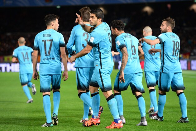 YOKOHAMA, JAPAN - DECEMBER 17:  Luis Suarez of Barcelona celebrates after scoring during the FIFA Club World Cup Semi Final match between Barcelona and Guangzhou Evergrande FC at International Stadium Yokohama on December 17, 2015 in Yokohama, Japan.  (Photo by Masterpress/Getty Images)
