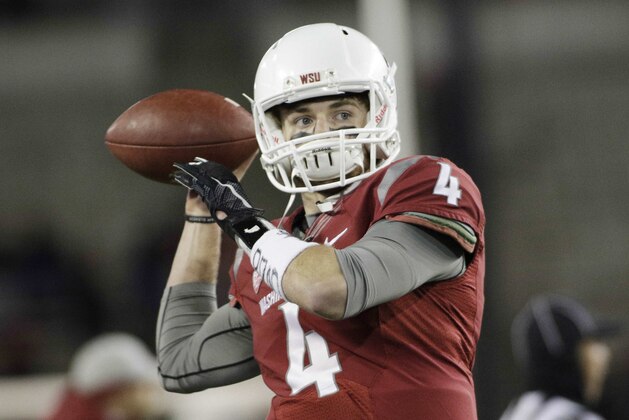 Washington State quarterback Luke Falk (4) warms up before an NCAA college football game, Saturday, Nov. 21, 2015, in Pullman, Wash. (AP Photo/Young Kwak)