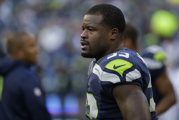 Seattle Seahawks running back Christine Michael stands on the field during warmups before a preseason NFL football game against the Oakland Raiders, Thursday, Sept. 3, 2015, in Seattle. (AP Photo/Elaine Thompson)