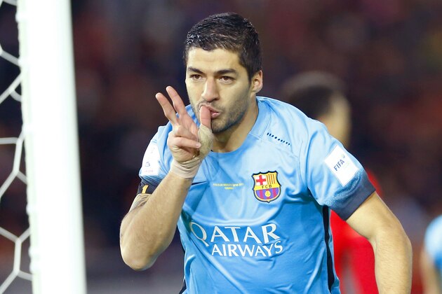 FC Barcelona’s Luis Suarez celebrates after scoring his second goal against Guangzhou Evergrande FC during their semifinal match at the FIFA Club World Cup soccer tournament in Yokohama, near Tokyo, Thursday, Dec. 17, 2015. (AP Photo/Shizuo Kambayashi)