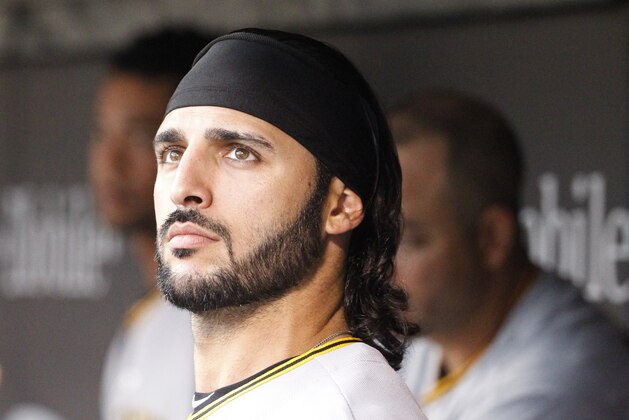 Pittsburgh Pirates first baseman Sean Rodriguez looks out of the dugout before a baseball game against the Minnesota Twins in Minneapolis, Tuesday, July 28, 2015. (AP Photo/Ann Heisenfelt)