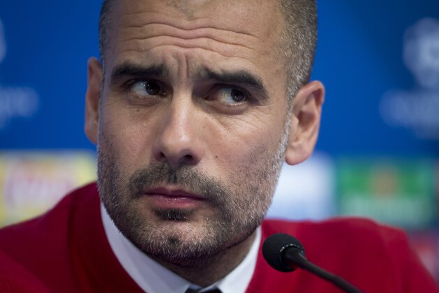 Bayern's head coach Pep Guardiola listens to a question during a press conference ahead of the Champions League Group F soccer match between Dinamo Zagreb and Bayern Munich, in Zagreb, Croatia, Tuesday, Dec. 8, 2015. (AP Photo/Darko Bandic)