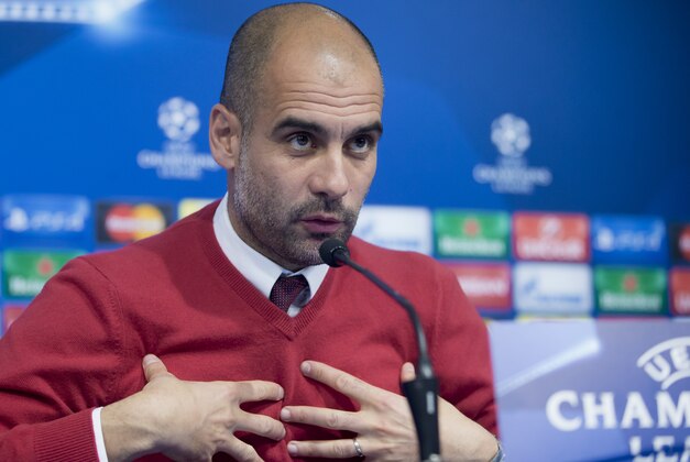 Bayern's head coach Pep Guardiola gestures during a press conference ahead of the Champions League Group F soccer match between Dinamo Zagreb and Bayern Munich, in Zagreb, Croatia, Tuesday, Dec. 8, 2015. (AP Photo/Darko Bandic)