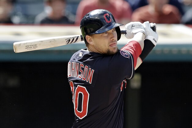 Cleveland Indians’ Chris Johnson watches the ball after hitting an RBI-single off Detroit Tigers starting pitcher Justin Verlander in the fifth inning of the first game of a baseball doubleheader, Sunday, Sept. 13, 2015, in Cleveland. Lonnie Chisenhall scored on the play. (AP Photo/Tony Dejak)