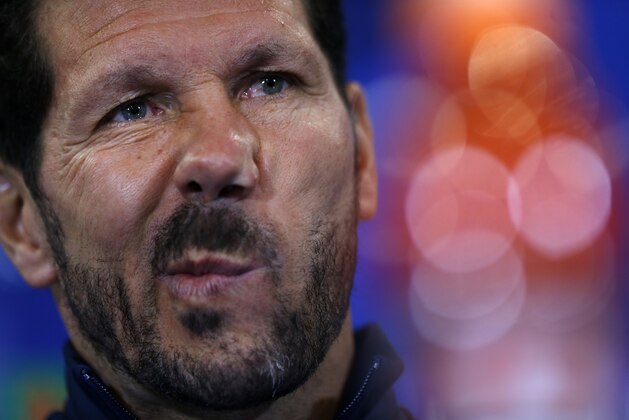 Atletico Madrid's head coach Diego Simeone listens to a question during a news conference at the Vicente Calderon stadium in Madrid, Tuesday, Nov. 24, 2015. Atletico Madrid will play against Galatasaray a Champions League group C soccer match on Wednesday.  (AP Photo/Francisco Seco)