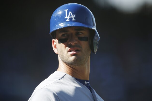 Los Angeles Dodgers center fielder Justin Ruggiano (27) waits to bat against the Colorado Rockies in the first inning of a baseball game Sunday, Sept. 27, 2015, in Denver. (AP Photo/David Zalubowski)