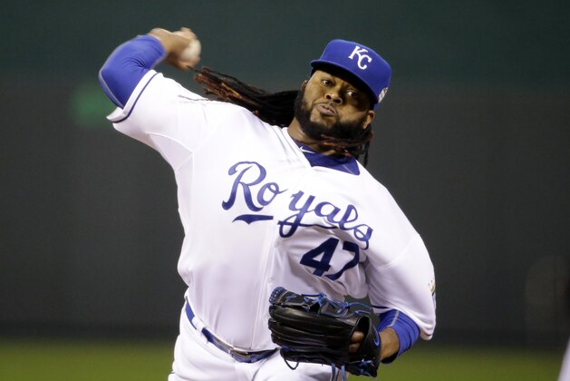 Kansas City Royals pitcher Johnny Cueto throws during the first inning of Game 2 of the Major League Baseball World Series against the New York Mets Wednesday, Oct. 28, 2015, in Kansas City, Mo. (AP Photo/David Goldman)
