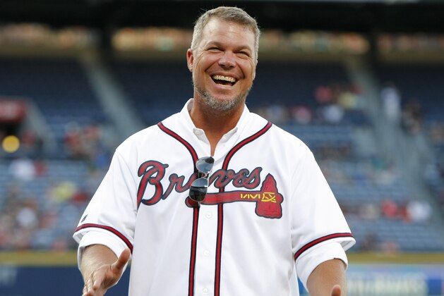 Former Atlanta Braves third baseman Chipper Jones laughs before a baseball game against the Miami Marlins, Friday, Aug. 7, 2015, in Atlanta. (AP Photo/Brett Davis)