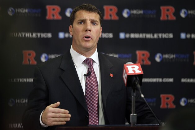 Chris Ash addresses a gathering after he was announced new NCAA college football coach for Rutgers,  Monday, Dec. 7, 2015, in Piscataway, N.J. Athletic director Julie Hermann and football coach Kyle Flood were fired Sunday, Nov. 29, 2015. (AP Photo/Mel Evans)