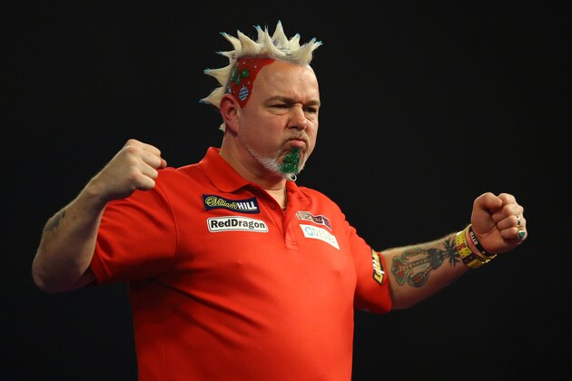 LONDON, ENGLAND - DECEMBER 17:  Peter Wright reacts to winning during his first round match against Keegan Brown on day one of the 2016 William Hill PDC World Darts Championships at Alexandra Palace on December 17, 2015 in London, England.  (Photo by Richard Heathcote/Getty Images)