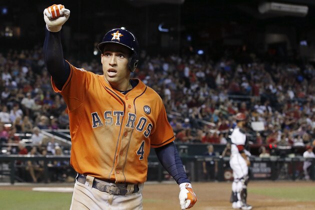 Houston Astros' George Springer pumps his fist to cheering Astros fans after he hit a home run against the Arizona Diamondbacks during the second inning of a baseball game Friday, Oct. 2, 2015, in Phoenix. (AP Photo/Ross D. Franklin) Houston Astros' George Springer pumps his fist to cheering Astros fans after he hit a home run against the Arizona Diamondbacks during the second inning of a baseball game Friday, Oct. 2, 2015, in Phoenix. (AP Photo/Ross D. Franklin)