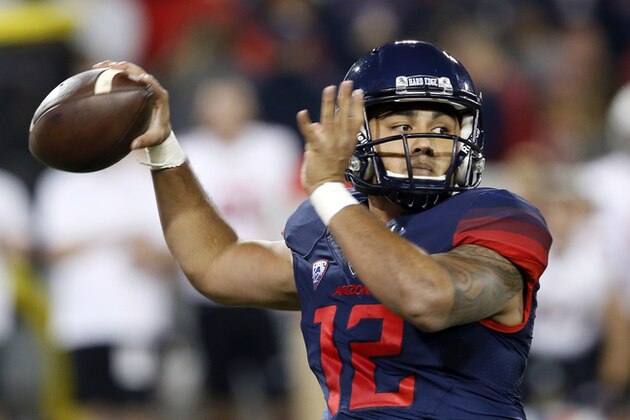 Arizona quarterback Anu Solomon (12) during the first half of an NCAA college football game against Utah, Saturday, Nov. 14, 2015, in Tucson, Ariz. (AP Photo/Rick Scuteri)