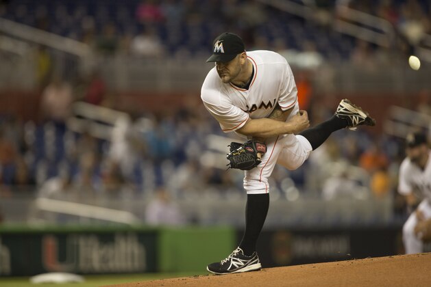 Miami Marlins starting pitcher Brad Penny throws to the Arizona Diamondbacks during the first inning of a baseball game in Miami, Thursday, Aug. 14, 2014. (AP Photo/J Pat Carter)