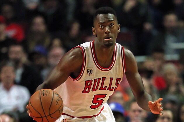 CHICAGO, IL - DECEMBER 14:  Bobby Portis #5 of the Chicago Bulls brings the ball up the court against the Philadelphia 76ers at the United Center on December 14, 2015 in Chicago, Illinois. The Bulls defeated the 76ers 115-96. NOTE TO USER: User expressly acknowledges and agrees that, by downloading and or using the photograph, User is consenting to the terms and conditions of the Getty Images License Agreement.  (Photo by Jonathan Daniel/Getty Images)