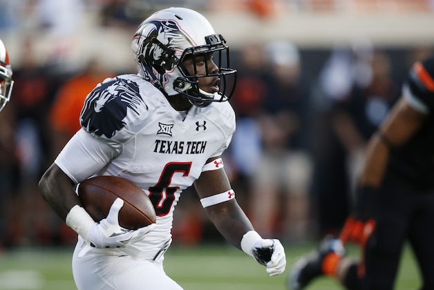 Texas Tech wide receiver Devin Lauderdale (6) is pictured during an NCAA college football game between Texas Tech and Oklahoma State in Stillwater, Okla., Thursday, Sept. 25, 2014. (AP Photo/Sue Ogrocki)