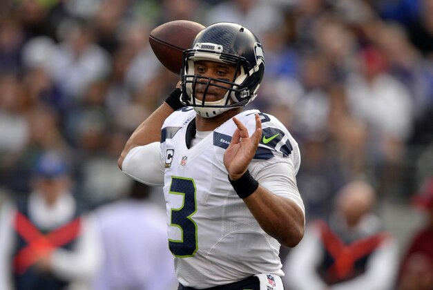 Dec 13, 2015; Baltimore, MD, USA;  Seattle Seahawks quarterback Russell Wilson (3) throws during the second half against the Baltimore Ravens at M&T Bank Stadium. Seattle Seahawks defeated Baltimore Ravens 35-6.  Mandatory Credit: Tommy Gilligan-USA TODAY Sports
