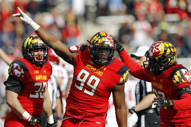 Maryland defensive lineman Quinton Jefferson (99) celebrates with teammates after recovering an Indiana fumble in the first half of an NCAA college football game, Saturday, Nov. 21, 2015, in College Park, Md. (AP Photo/Patrick Semansky)