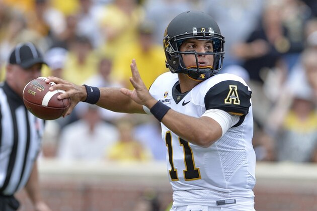 Appalachian State quarterback Taylor Lamb throws a pass during the first half of an NCAA college football game against Clemson Saturday,  Sept. 12, 2015,  in Clemson, S.C. (AP Photo/Richard Shiro)