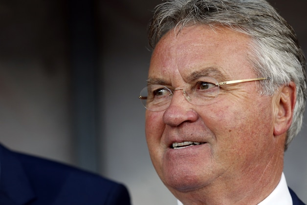 Netherlands' head coach Guus Hiddink watches his team as they line up prior to the Euro 2016 soccer qualifying group E match between the Latvia and Netherlands at Skonto stadium in Riga, Latvia, Friday, June 12, 2015. (AP Photo/Mindaugas Kulbis)