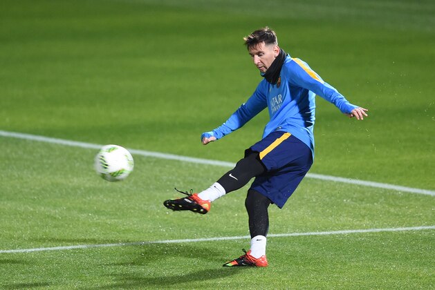 Spain's FC Barcelona forward Lionel Messi attends a football practice session in Yokohama, a suburb of Tokyo, on December 14, 2015. FC Barcelona will play against Asian champions Guagzhou Evergrande of China at the semi-finals of the Club World Cup in Yokohama on December 17.      AFP PHOTO / Toru YAMANAKA / AFP / TORU YAMANAKA        (Photo credit should read TORU YAMANAKA/AFP/Getty Images)