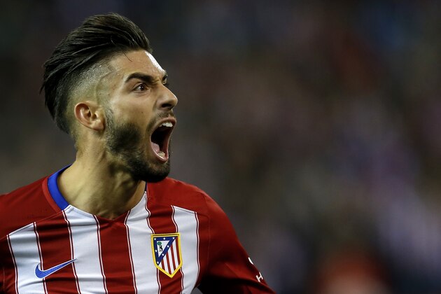 Atletico Madrid's Yannick Carrasco celebrates after scoring his side's second goal against Valencia during the Spanish La Liga soccer match between Atletico Madrid and Valencia at the Vicente Calderon stadium in Madrid, Sunday, Oct. 25, 2015. Carrasco scored once in Atletico's 2-1 victory. (AP Photo/Francisco Seco)