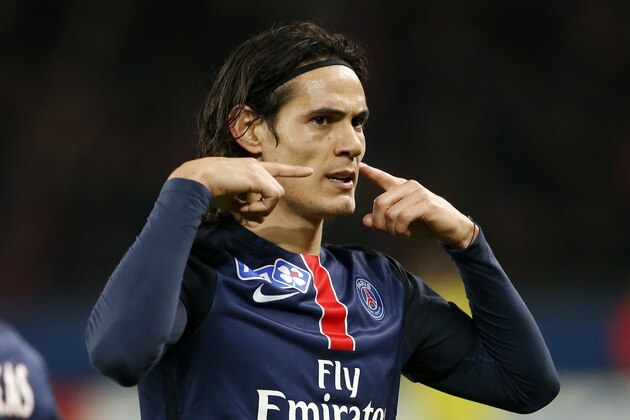 PARIS, FRANCE - DECEMBER 16: Edinson Cavani of PSG celebrates scoring the winning goal during the French League Cup (Coupe de la Ligue) match between Paris Saint-Germain (PSG) and AS Saint-Etienne (ASSE) at Parc des Princes stadium on December 16, 2015 in Paris, France. (Photo by Jean Catuffe/Getty Images)
