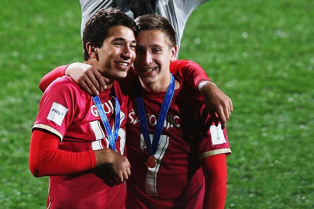 AUCKLAND, NEW ZEALAND - JUNE 20:  Marko Grujic of Serbia and Ivan Saponjic of Serbia celebrate after winning the FIFA U-20 World Cup Final match between Brazil and Serbia at North Harbour Stadium on June 20, 2015 in Auckland, New Zealand.  (Photo by Hannah Peters/Getty Images)
