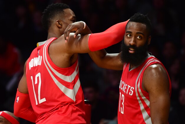 LOS ANGELES, CA - DECEMBER 17:  James Harden #13 and Dwight Howard #12 of the Houston Rockets celebrate a 107-87 win over the Los Angeles Lakers at Staples Center on December 17, 2015 in Los Angeles, California.  NOTE TO USER: User expressly acknowledges and agrees that, by downloading and or using this Photograph, user is consenting to the terms and condition of the Getty Images License Agreement.  (Photo by Harry How/Getty Images)