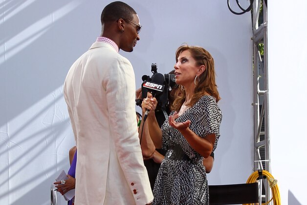 LOS ANGELES, CA - JULY 14:  Chris Bosh of the Miami Heat talks with Colleen Dominguez of ESPN at the 2010 ESPY Awards at Nokia Theatre L.A. Live on July 14, 2010 in Los Angeles, California.  (Photo by Alexandra Wyman/Getty Images for ESPY)