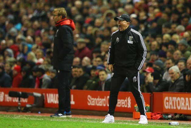 LIVERPOOL, ENGLAND - DECEMBER 13:  Tony Pulis, manager of West Bromwich Albion shouts as Jurgen Klopp, manager of Liverpool looks on during the Barclays Premier League match between Liverpool and West Bromwich Albion at Anfield on December 13, 2015 in Liverpool, England.  (Photo by Alex Livesey/Getty Images)