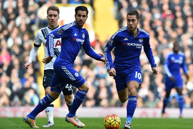Chelsea's Belgian midfielder Eden Hazard (R) and Chelsea's Spanish midfielder Cesc Fabregas run during the English Premier League football match between Tottenham Hotspur and Chelsea at White Hart Lane in north London on November 29, 2015.     AFP PHOTO / BEN STANSALL

RESTRICTED TO EDITORIAL USE. No use with unauthorized audio, video, data, fixture lists, club/league logos or 'live' services. Online in-match use limited to 75 images, no video emulation. No use in betting, games or single club/league/player publications. / AFP / BEN STANSALL        (Photo credit should read BEN STANSALL/AFP/Getty Images)
