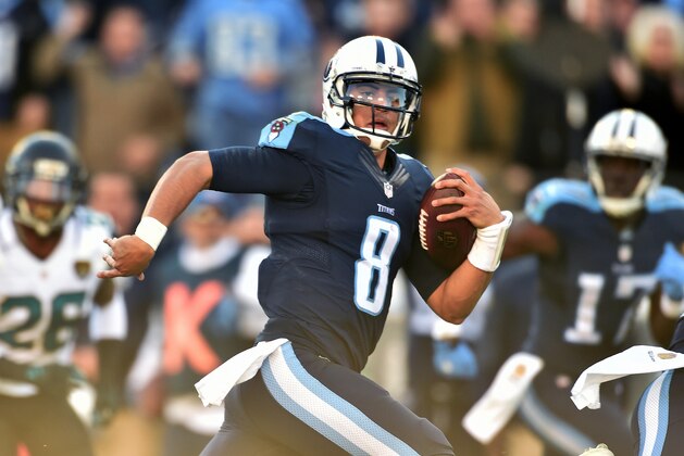 NASHVILLE, TN - DECEMBER 06:  Quarterback Marcus Mariota #8 of the Tennessee Titans carries the ball during a NFL game against the Jacksonville Jaguars at Nissan Stadium on December 6, 2015 in Nashville, Tennessee.  (Photo by Ronald C. Modra/Sports Imagery/Getty Images)