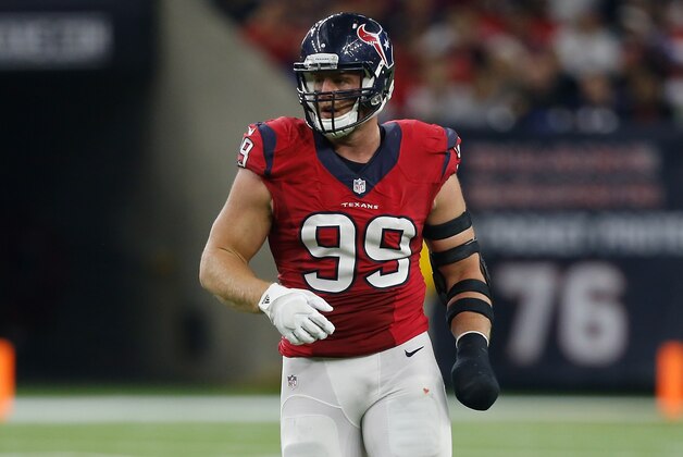 HOUSTON, TX - DECEMBER 13:  J.J. Watt #99 of the Houston Texans played with a cast on his broken left hand against the New England Patriots at NRG Stadium on December 13, 2015 in Houston, Texas.  (Photo by Bob Levey/Getty Images)