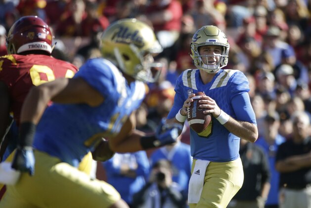UCLA quarterback Josh Rosen looks to pass during the first half of an NCAA college football game against Southern California, Saturday, Nov. 28, 2015, in Los Angeles. (AP Photo/Jae C. Hong)