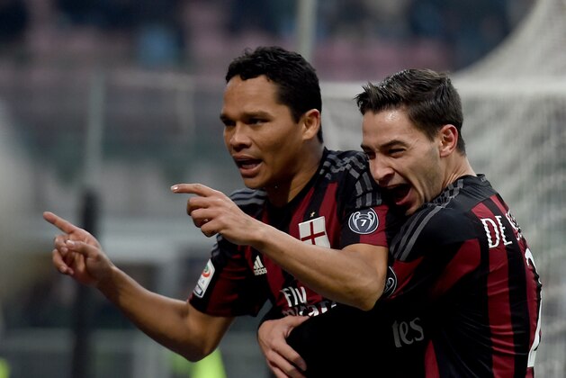 MILAN, ITALY - DECEMBER 13: Carlos Bacca of AC Milan (L) celebrates after scoring the opening goal during the Serie A match betweeen AC Milan and Hellas Verona FC at Stadio Giuseppe Meazza on December 13, 2015 in Milan, Italy. (Photo by Claudio Villa/Getty Images) MILAN, ITALY - DECEMBER 13: Carlos Bacca of AC Milan (L) celebrates after scoring the opening goal during the Serie A match betweeen AC Milan and Hellas Verona FC at Stadio Giuseppe Meazza on December 13, 2015 in Milan, Italy. (Photo by Claudio Villa/Getty Images)