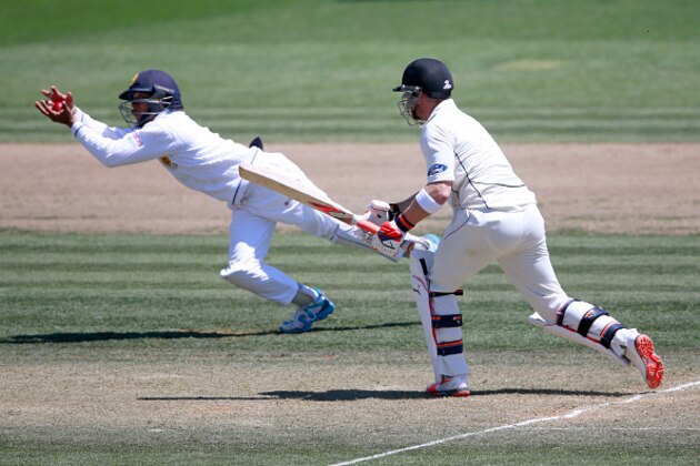 HAMILTON, NEW ZEALAND - DECEMBER 19:  Brendon McCullum of New Zealand is caught out by Kusal Mendis of Sri Lanka  during day two of the Second Test match between New Zealand and Sri Lanka at Seddon Park on December 19, 2015 in Hamilton, New Zealand.  (Photo by Phil Walter/Getty Images)