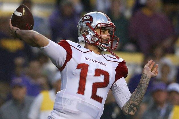 Western Kentucky quarterback Brandon Doughty (12) throws the ball during the first half an NCAA college football game against LSU in Baton Rouge, La., Saturday, Oct. 24, 2015. (AP Photo/Jonathan Bachman)