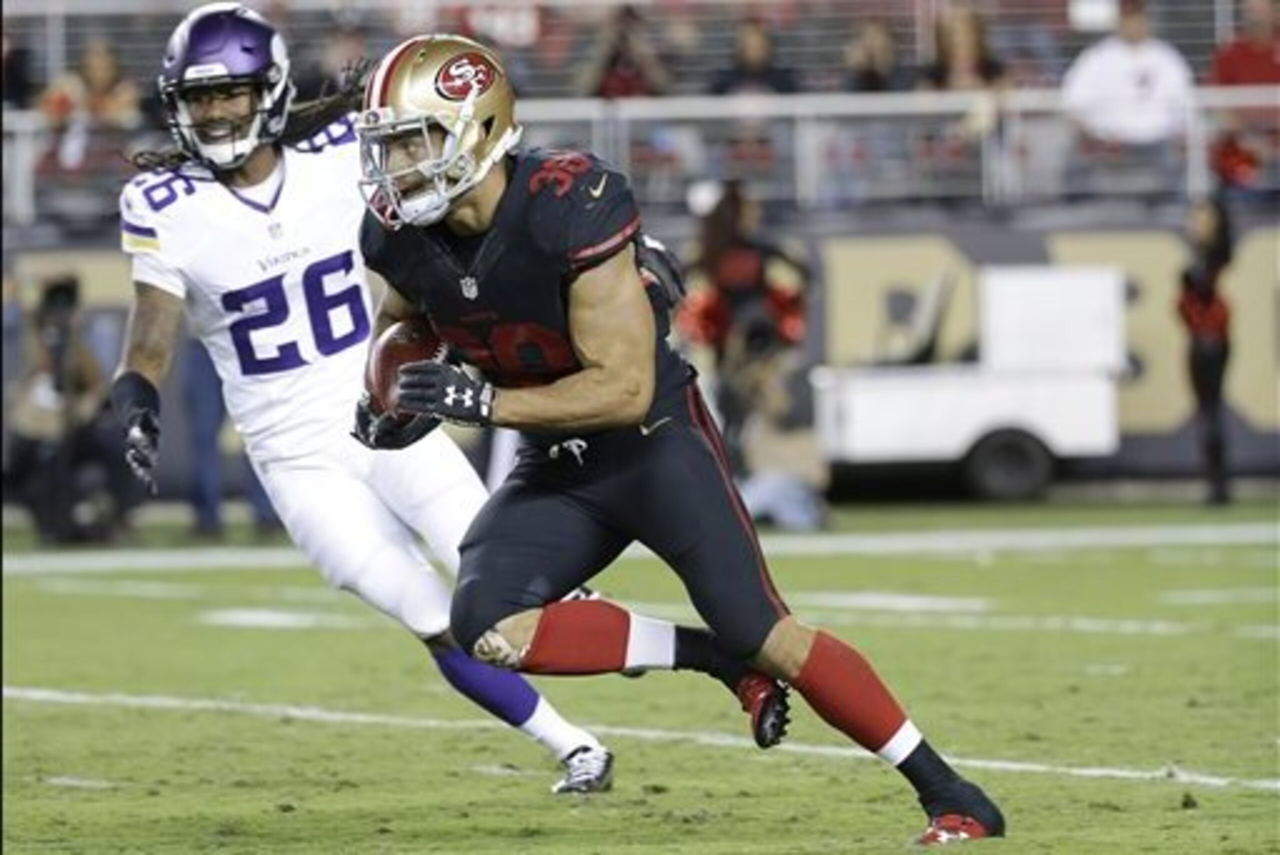 San Francisco 49ers' Jarryd Hayne (38) runs against the Minnesota Vikings during the first half of an NFL football game in Santa Clara, Calif., Monday, Sept. 14, 2015. (AP Photo/Marcio Jose Sanchez)