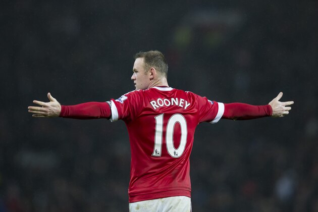 Manchester United's Wayne Rooney gestures during the English Premier League soccer match between Manchester United and Norwich City at Old Trafford Stadium, Manchester, England, Saturday, Dec. 19, 2015. (AP Photo/Jon Super)