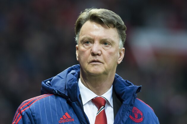Manchester United's new manager Louis van Gaal takes to the touchline before his team's English Premier League soccer match between Manchester United and Norwich City at Old Trafford Stadium, Manchester, England, Saturday, Dec. 19, 2015. (AP Photo/Jon Super)
