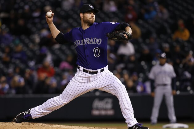 Colorado Rockies relief pitcher Adam Ottavino throws against the San Diego Padres during the eighth inning of a baseball game Monday, April 20, 2015, in Denver. (AP Photo/Jack Dempsey)
