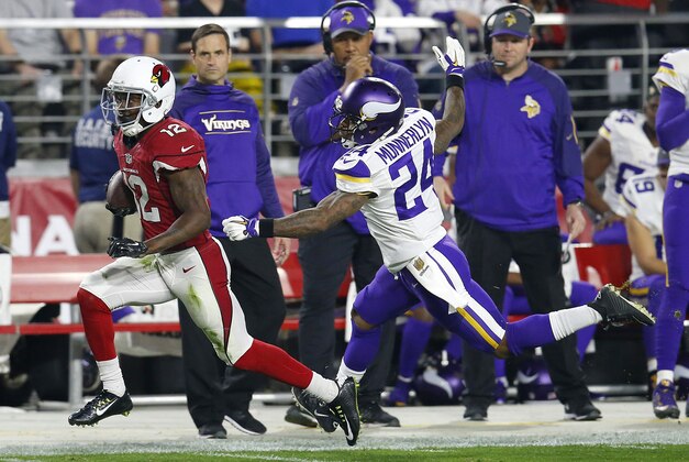 Arizona Cardinals wide receiver John Brown (12) breaks free from Minnesota Vikings cornerback Captain Munnerlyn (24) for a touchdown during the first half of an NFL football game, Thursday, Dec. 10, 2015, in Glendale, Ariz. (AP Photo/Rick Scuteri)