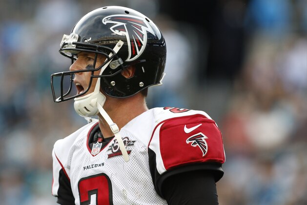 Atlanta Falcons' Matt Ryan (2) yells in frustration as he makes his way back to the bench as the Carolina Panthers take over possession of the football during the second half of an NFL football game in Charlotte, N.C., Sunday, Dec. 13, 2015. The Carolina Panthers won 38-0.(AP Photo/Bob Leverone)
