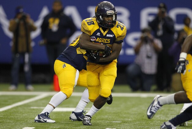 Dec 19, 2015; Atlanta, GA, USA; North Carolina A&T Aggies running back Tarik Cohen (28) runs the ball for a touchdown against the Alcorn State Braves in the first quarter of the 2015 Celebration Bowl at the Georgia Dome. Mandatory Credit: Brett Davis-USA TODAY Sports