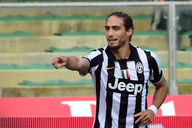 Juventus' Uruguayan defender Jose Martin Caceres celebrates after scoring a goal during the Serie A football match Chievo Verona vs Juventus at the Bentegodi Stadium in Verona on August 30, 2014. AFP PHOTO / GIUSEPPE CACACE        (Photo credit should read GIUSEPPE CACACE/AFP/Getty Images)