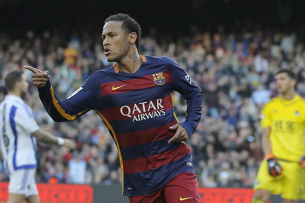 FC Barcelona's Neymar reacts after scoring against Real Sociedad during a Spanish La Liga soccer match at the Camp Nou stadium in Barcelona, Spain, Saturday, Nov. 28, 2015. (AP Photo/Manu Fernandez)
